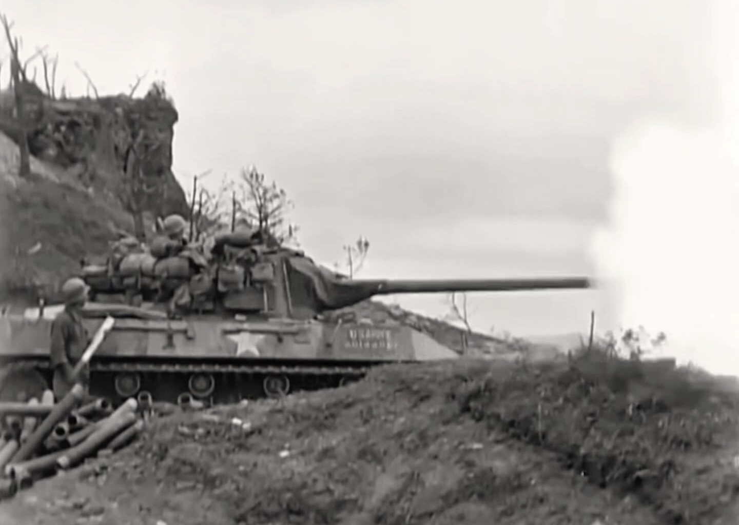 M18 Hellcat TD attacking Japanese fortified positions at Shuri on Okinawa in support of the 306th Infantry Regiment in 1945