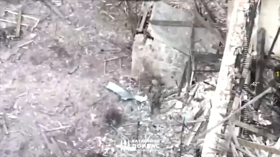 Russian soldier was trying to clear the ruins when he was killed through a wall by small arms fire.