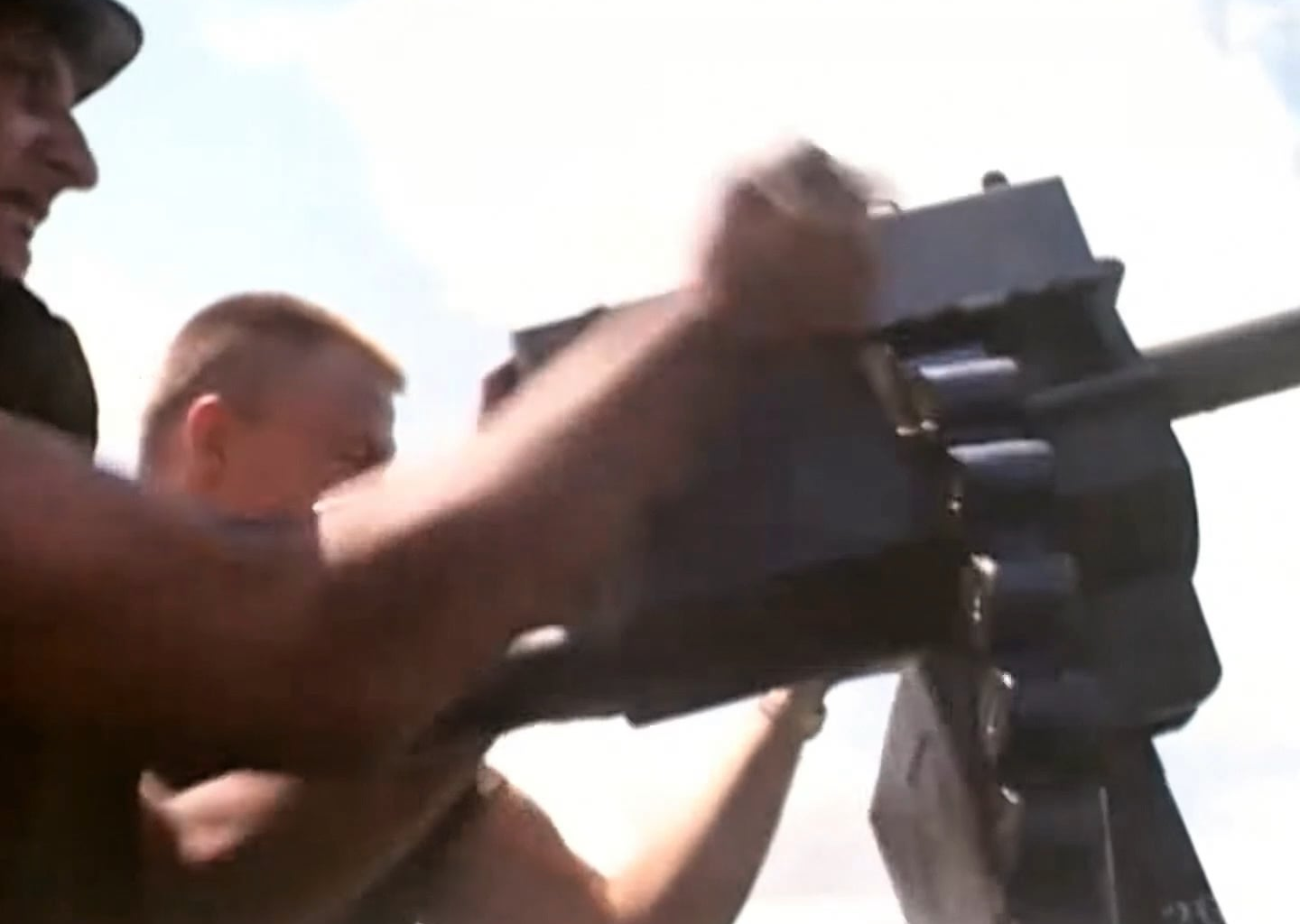Honeywell Mark 18 hand-cranked 40mm Grenade Launcher in action on a PBR in Vietnam in March 1969
