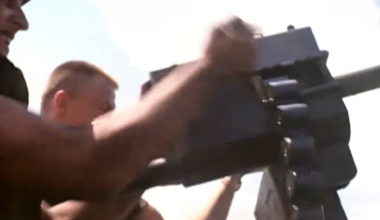 Honeywell Mark 18 hand-cranked 40mm Grenade Launcher in action on a PBR in Vietnam in March 1969