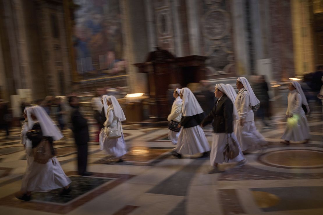 Nuns attend Pope Francis' lying in state on Friday in St. Peter's Basilica.