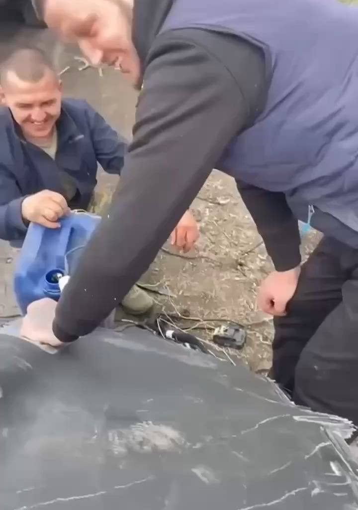 Industrious Ukrainians are pumping gas from a downed Shahed drone. Nothing goes to waste in the war effort!