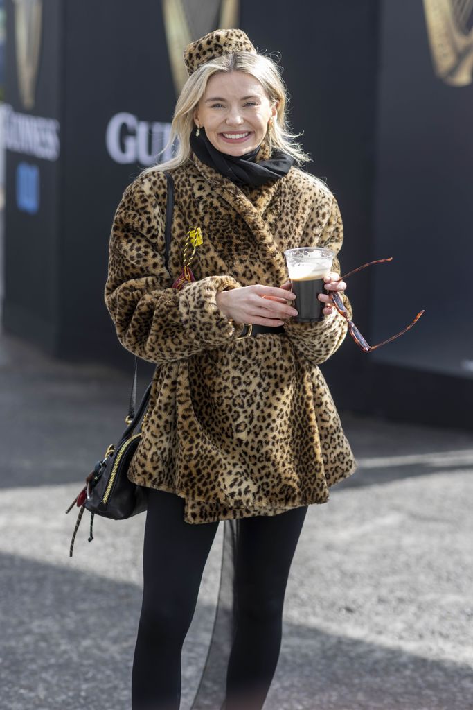 Georgia Toffolo enjoys a pint of Guinness at the festival