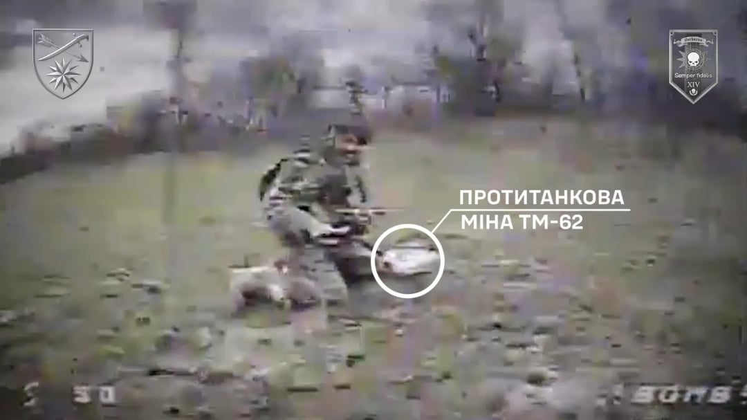 Russian soldier carrying a improvised satchel charge from a antitank mine is caught in the open by a Ukranian FPV drone.