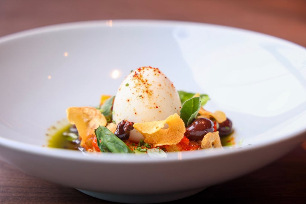 Ratatouille at CulinArt 1862 is a colourful mix of fresh vegetables, herbs and black olives served with a Rén egg in the middle. Photo: Dickson Lee Ratatouille at CulinArt 1862 is a colourful mix of fresh vegetables, herbs and black olives served with a Rén egg in the middle. Photo: Dickson Lee