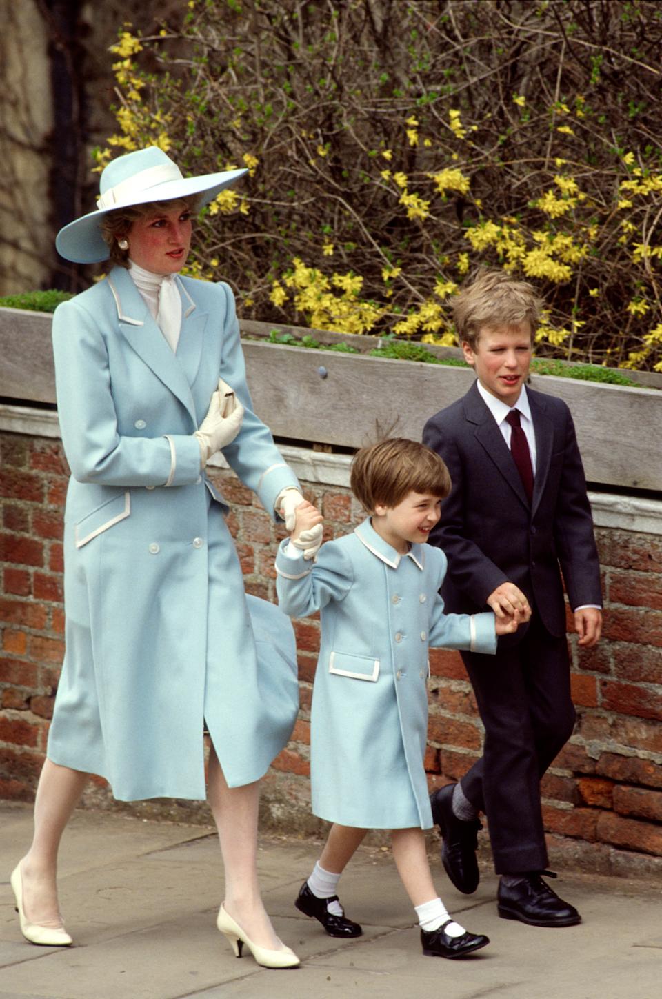 Prince William, Princess Diana and Peter Phillips walking away from St. George's Chapel on Easter 1987