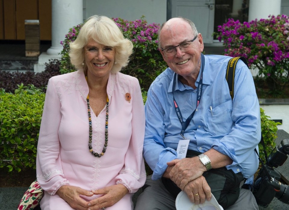 Camilla, Duchess of Cornwall, and a man sitting together.