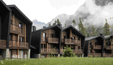 G22 projects tucks mountain village lodges in italy's alpine peaks