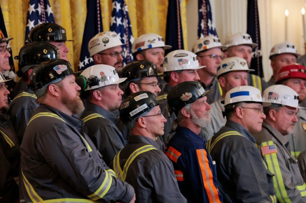 Coal and energy workers listen to President Donald Trump speak in the East Room of the White House on April 8, 2025. (Anna Moneymaker/Getty)