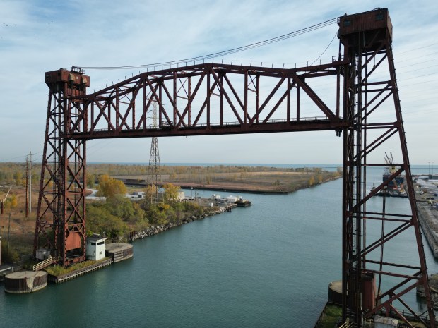 Bridge #710 frames an empty parcel of land, what remains of the former U.S. Steel South Works site, on Oct. 22, 2024. The parcel of land is surrounded by water on three sides including Lake Michigan to the east and the Calumet River to the south. PsiQuantum has plans to anchor the new Illinois Quantum & Microelectronics Park, a 128-acre quantum campus on the border between Illinois and Indiana. (Stacey Wescott/Chicago Tribune)