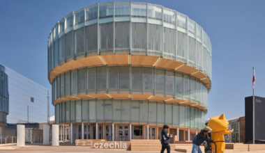 translucent glass facade outlines czech pavilion's spiral form at expo 2025 osaka