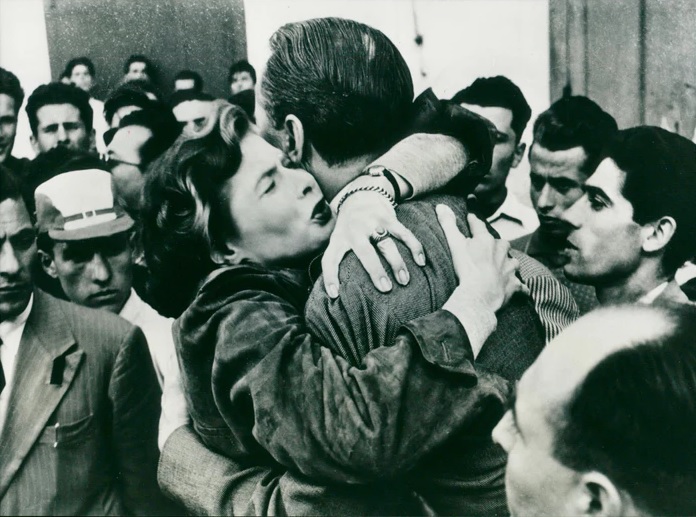 Ingrid Bergman and George Sanders in the climactic scene of Journey to Italy, dir. Roberto Rossellini, 1954. Unknown author (WDR), distributed by: Titanus Distribuzione, Public domain, via Wikimedia Commons.