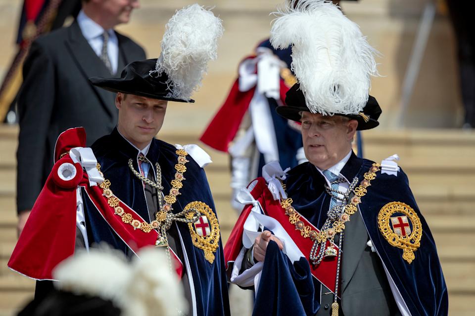 Prince William and Prince Andrew on Garter Day wearing feathered hats