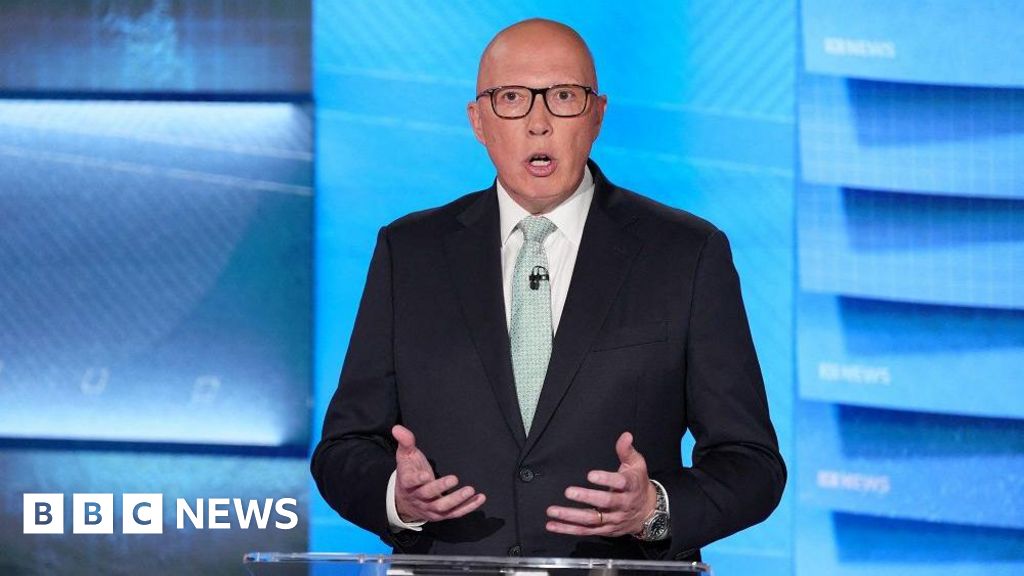 Australia opposition leader clarifies he believes in climate change after debate