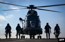 A helicopter on the Romanian Navy frigate Regina Maria during a military drill on the Black Sea earlier this month.