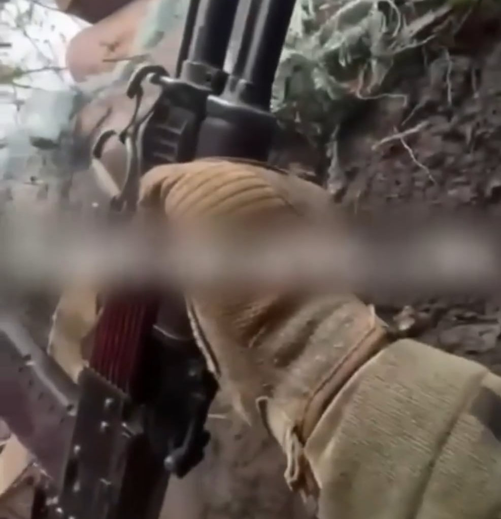 UA POV: Ukrainian soldier records the moment a mortar lands in his trench and causes severe damage to his comrade's arm.