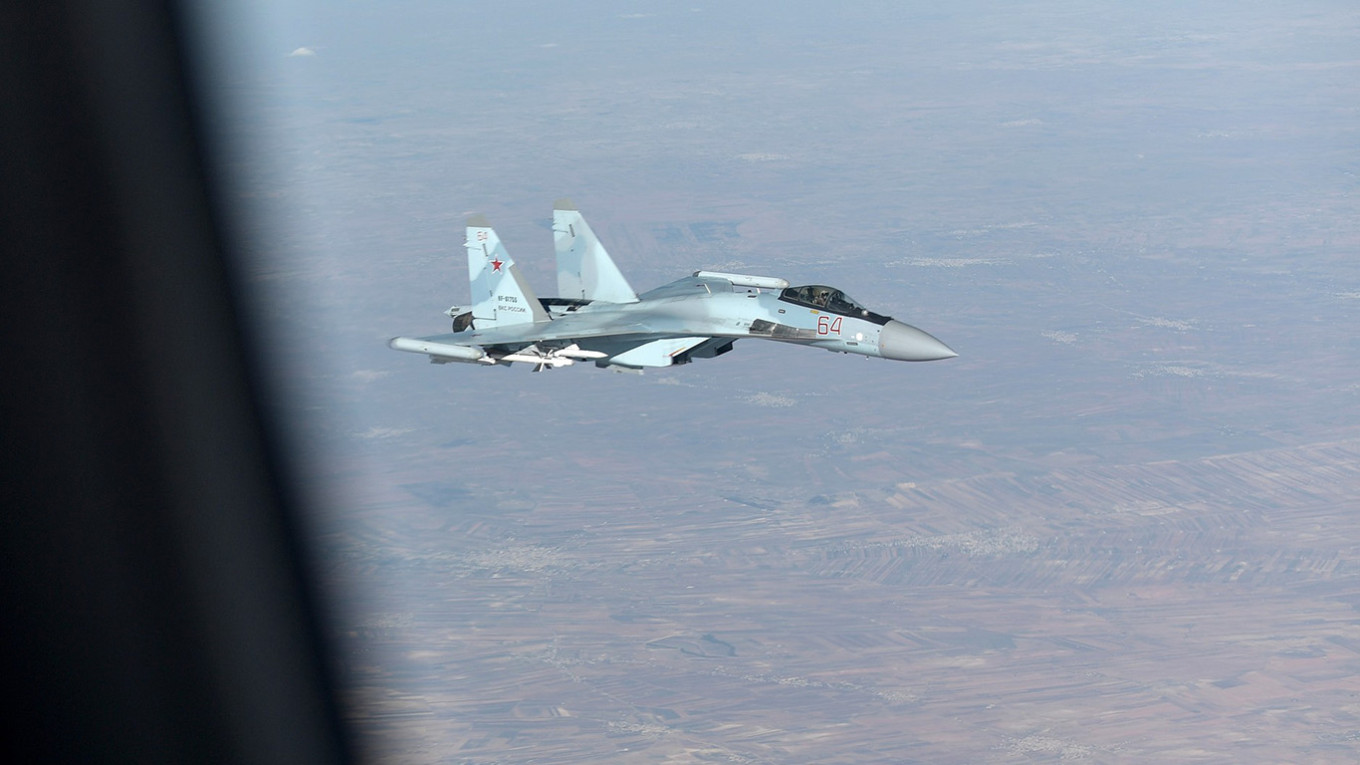 
					A Russian Air Force jet fighter in Syria.					 					kremlin.ru				