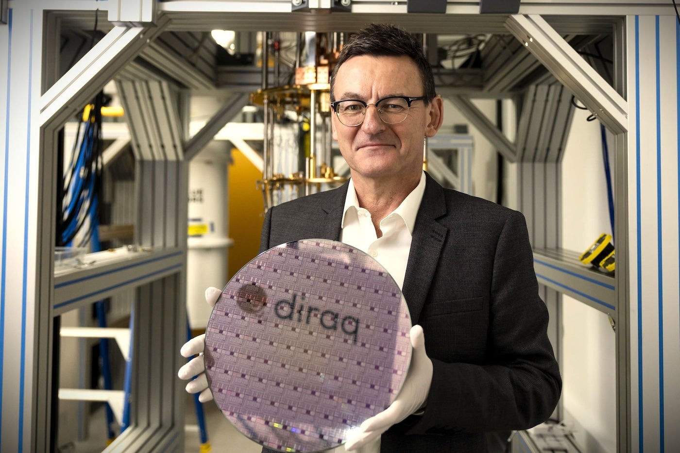 Andrew Dzurak, founder and CEO of Australian startup Diraq, holds one of the company’s projects.