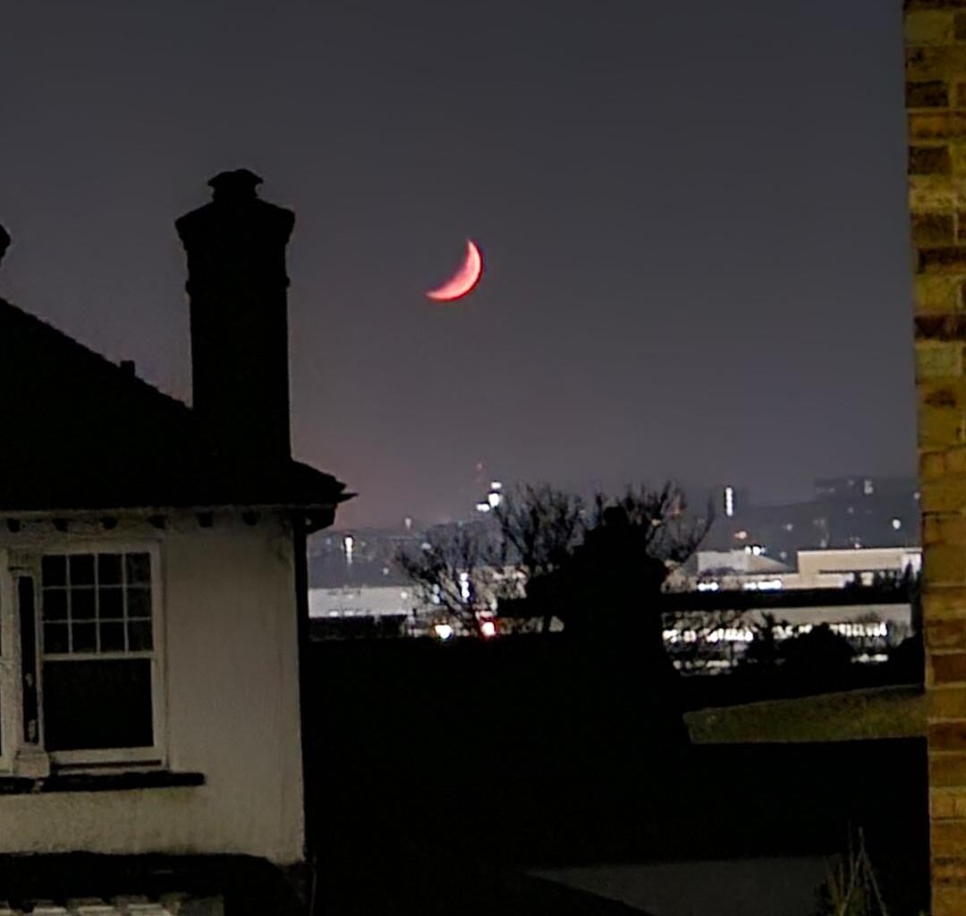 Giant red floating bannan AKA The Moon