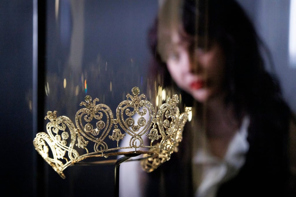 A gallery assistant poses with the Manchester Tiara, which was commissioned in 1903 by Consuelo, the Dowager Duchess of Manchester, and features in Cartier, an exhibition in London. Photo: EPA A gallery assistant poses with the Manchester Tiara, which was commissioned in 1903 by Consuelo, the Dowager Duchess of Manchester, and features in Cartier, an exhibition in London. Photo: EPA