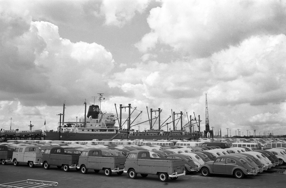 Thousands of Volkswagen cars and trucks are waiting to be loaded on a ship at the Hamburg port for shipment to the United States in May 1963, just months before America placed a 25% tax on European truck exports that remains in place to this day.