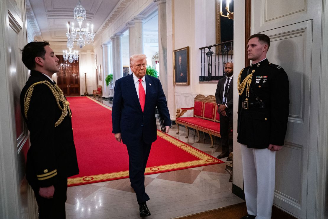 President Donald Trump arrives for an executive order signing ceremony in the East Room of the White House on April 8, 2025.
