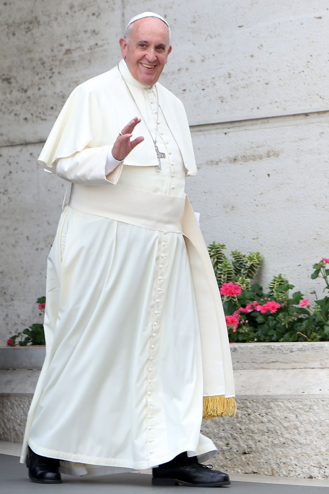 Unfussy white cassocks and simple black shoes ruled Francis' everyday style choices.
