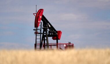 An oil pumpjack in a field near Kindersley, Saskatchewan, Canada