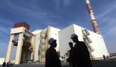 A group of workers outside the reactor building at the Russian-built Bushehr nuclear power plant in southern Iran