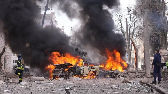 Ukrainian rescuer working at the burning site of a missile attack in Sumy, Ukraine on April 13 2025