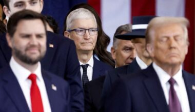 Apple chief executive Tim Cook seated behind US President Donald Trump and vice-president JD Vance at the inauguration in Washington in January