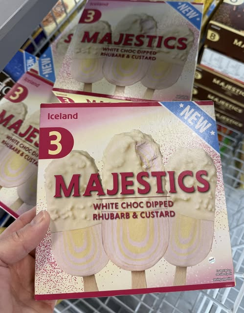 Box of three white chocolate dipped rhubarb and custard ice lollies.