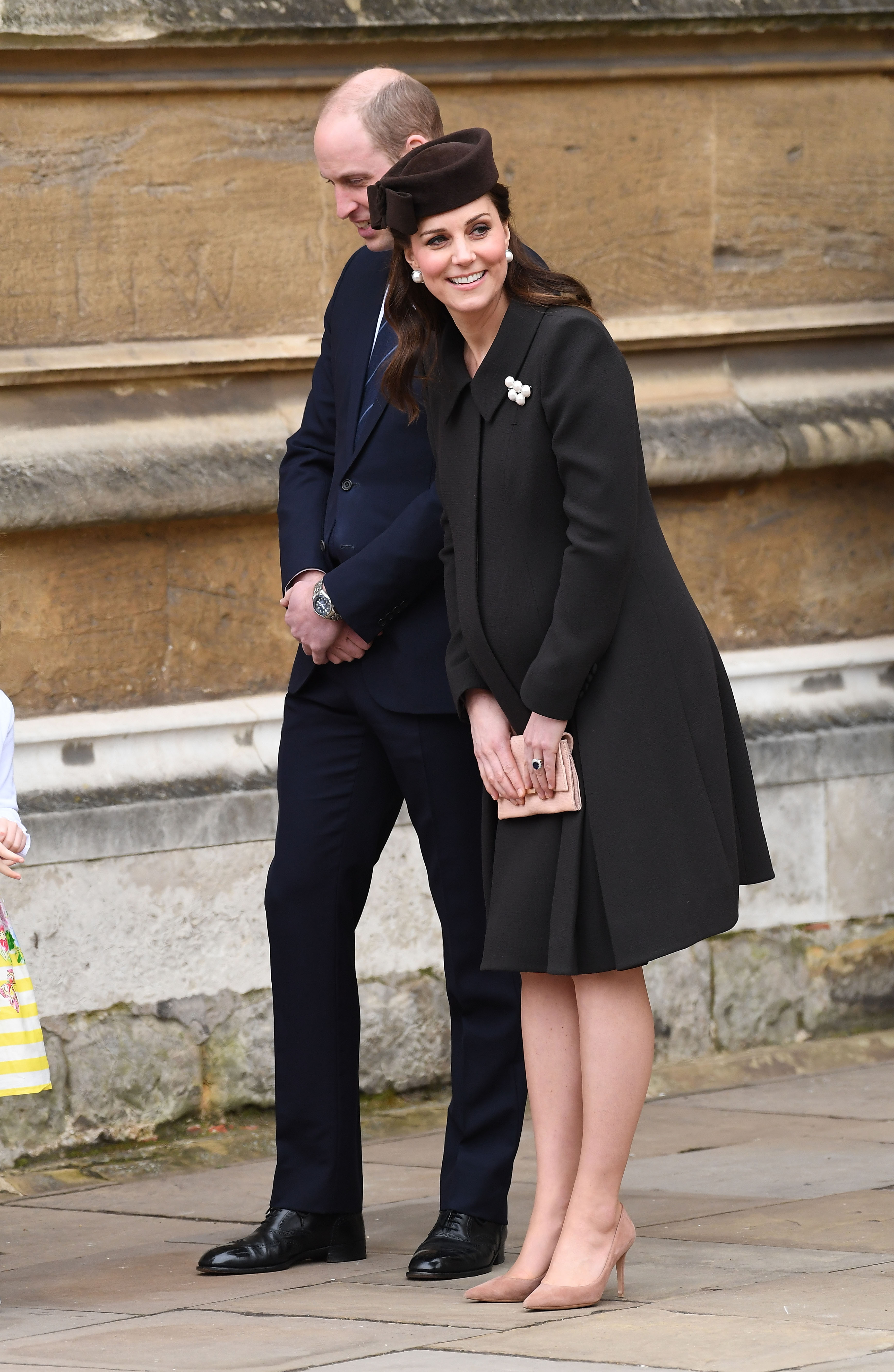 Kate Middleton wears a brown Catherine Walker coat