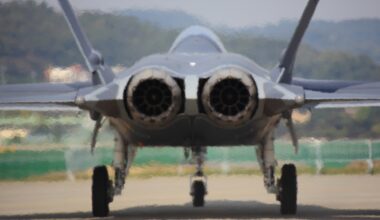 Back view of an air force KF-21 Boramae fighter plane parked on airstrip at Seoul Airport