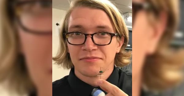 Teen charged with murder, tearful vigil held