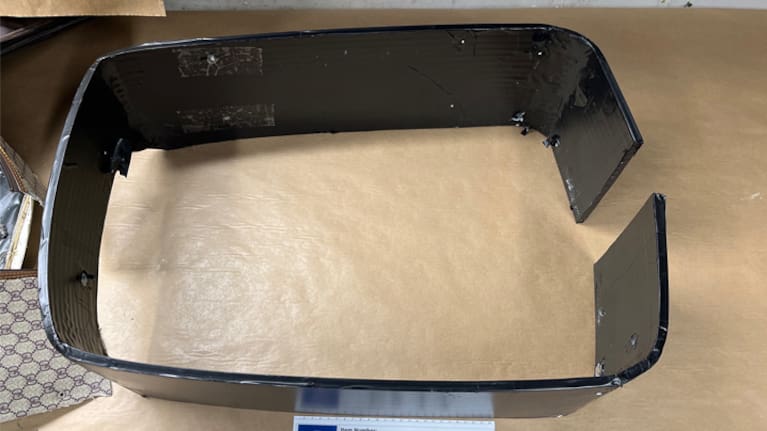 Methamphetamine hidden within plastic panelling inside a passenger’s suitcase.