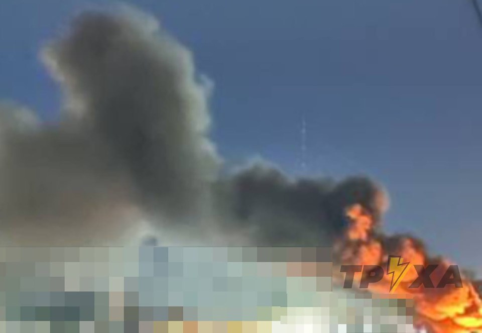 Smoke and fire from a missile strike in Kyiv.