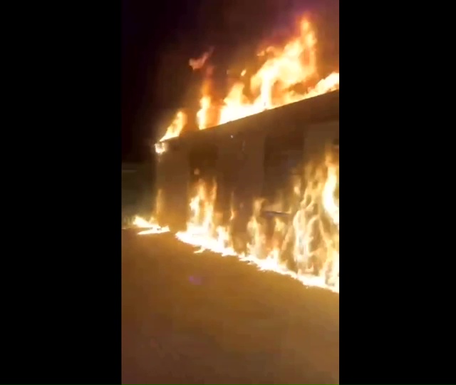 Building engulfed in flames.