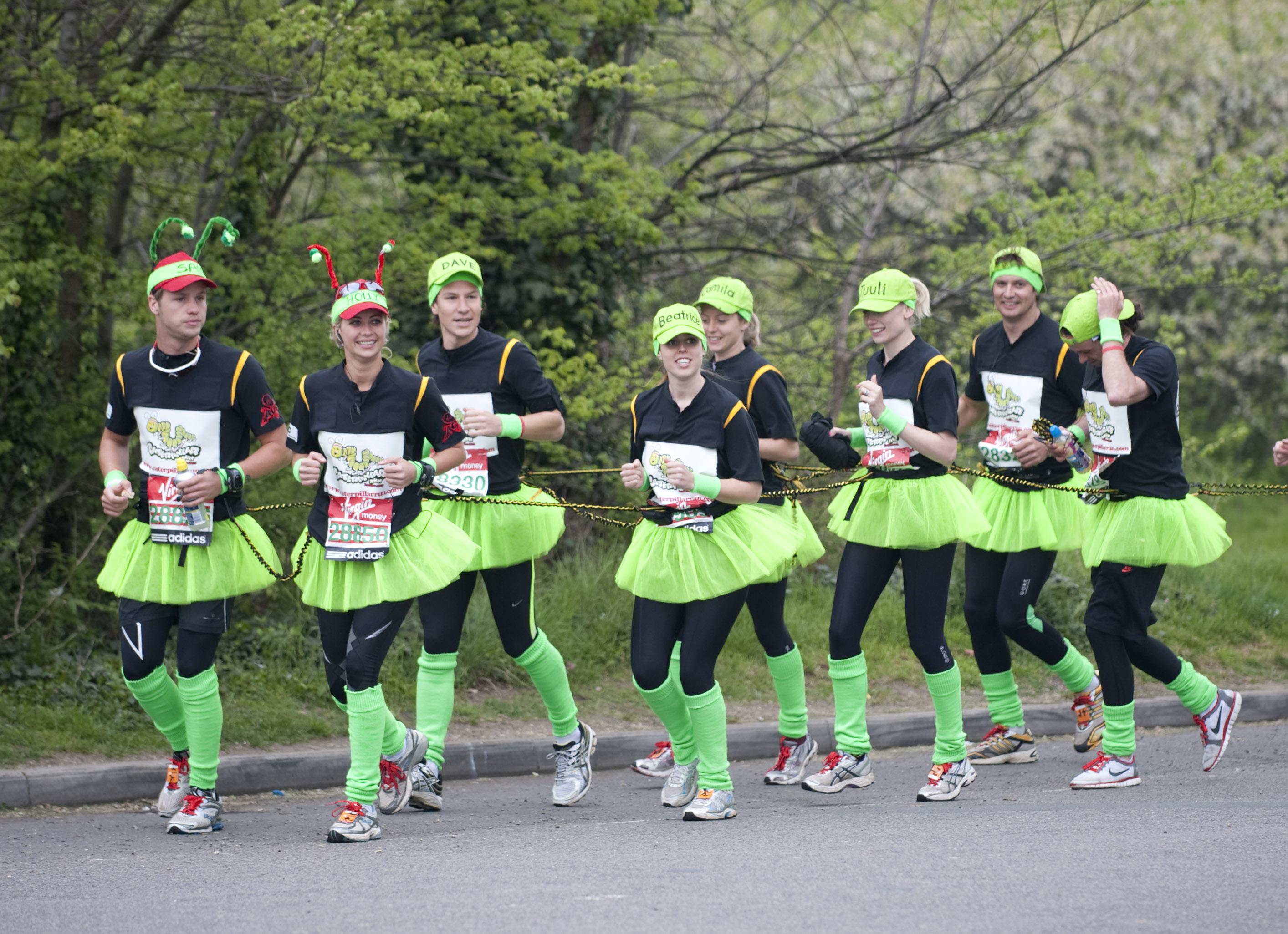 Princess Beatrice running the London Marathon in a green tutu