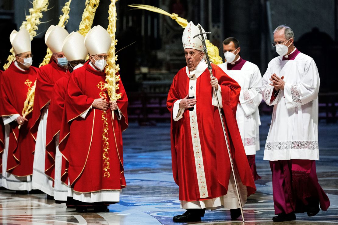 Red and white are standard colors for papal vestments, but Francis kept his simple and lightly accessorized.