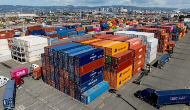 Cargo containers line a shipping terminal at the Port of Oakland on Thursday, April 3, 2025, in Oakland, Calif. (AP Photo/Noah Berger)