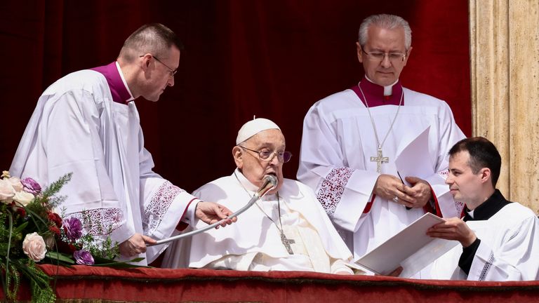 Pope Francis speaks from a balcony, on the day of the "Urbi et Orbi" (to the city and to the world) message at St. Peter's Square, on Easter Sunday, in the Vatican, April 20, 2025. REUTERS/Yara Nardi