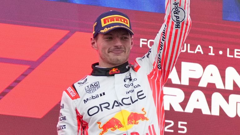 Red Bull driver Max Verstappen of the Netherlands celebrates with his trophy after winning the Japanese Formula One Grand Prix at the Suzuka Circuit in Suzuka, central Japan, Sunday, April 6, 2025. (AP Photo/Hiro Komae)