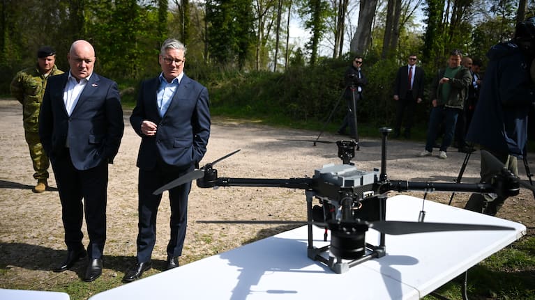 UK Prime Minister, Sir Keir Starmer, and Prime Minister of New Zealand, Christopher Luxon, look at drones on a display by SYOS, during a visit to a military base training Ukrainian troops, on April 22, 2025 in West of England.