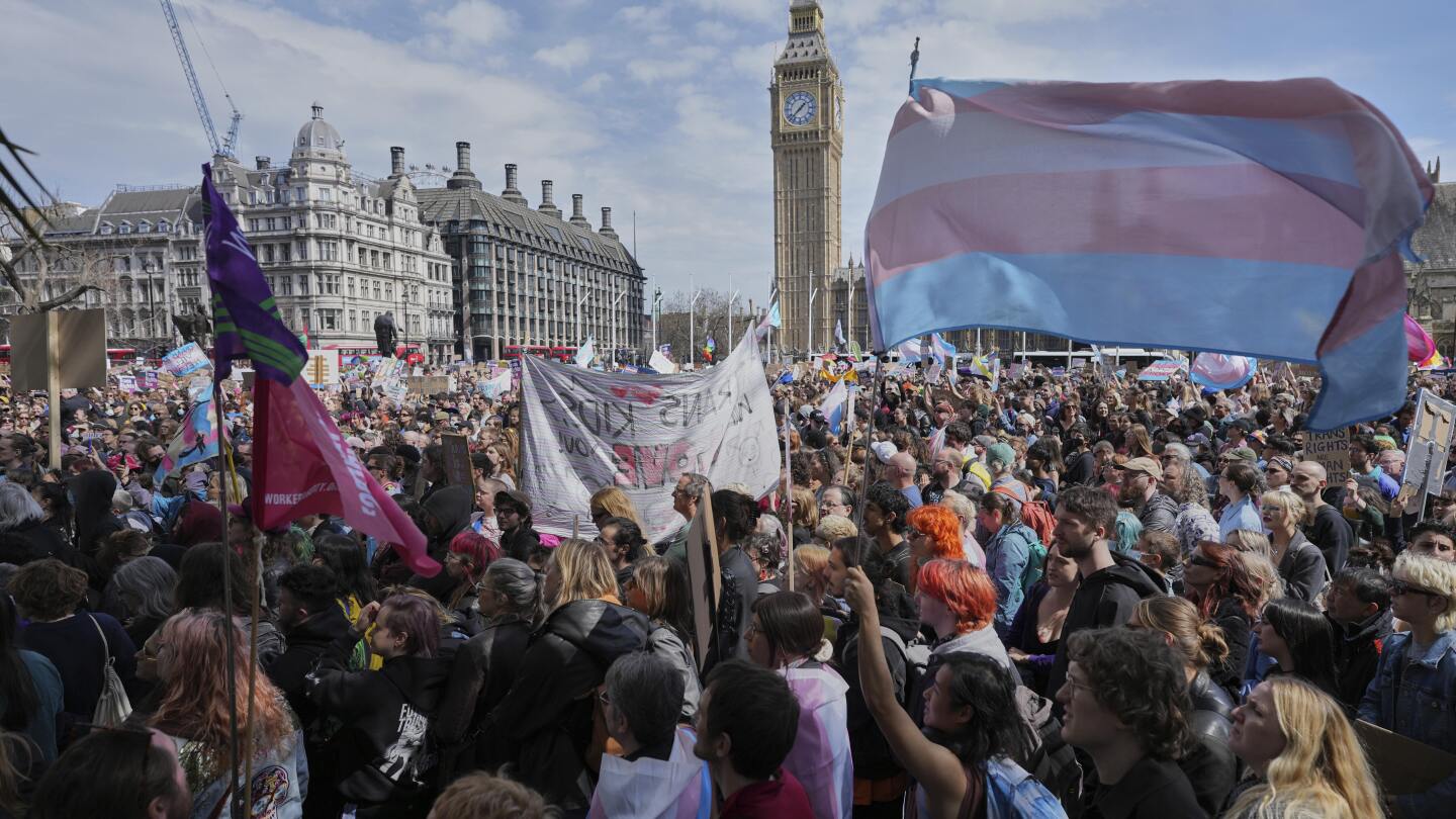 Thousands gather in London to support trans rights following UK ruling over definition of woman