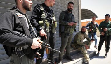 Clashes between Druze gunmen and pro-government fighters in Syrian capital kill at least 10