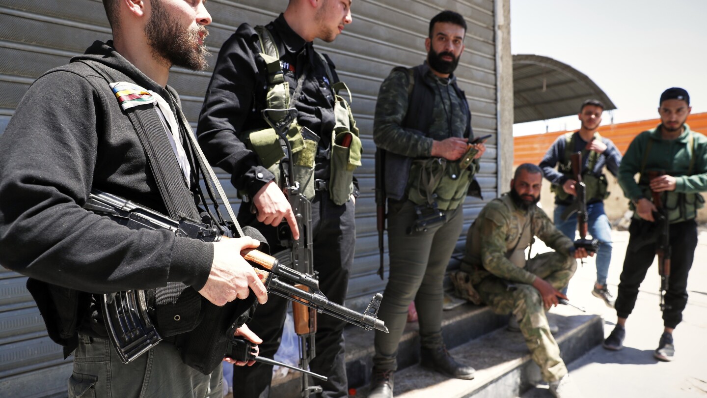 Clashes between Druze gunmen and pro-government fighters in Syrian capital kill at least 10
