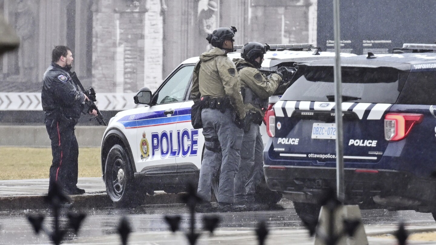 Canadian police say arrest made after man barricaded himself inside Parliament's east block