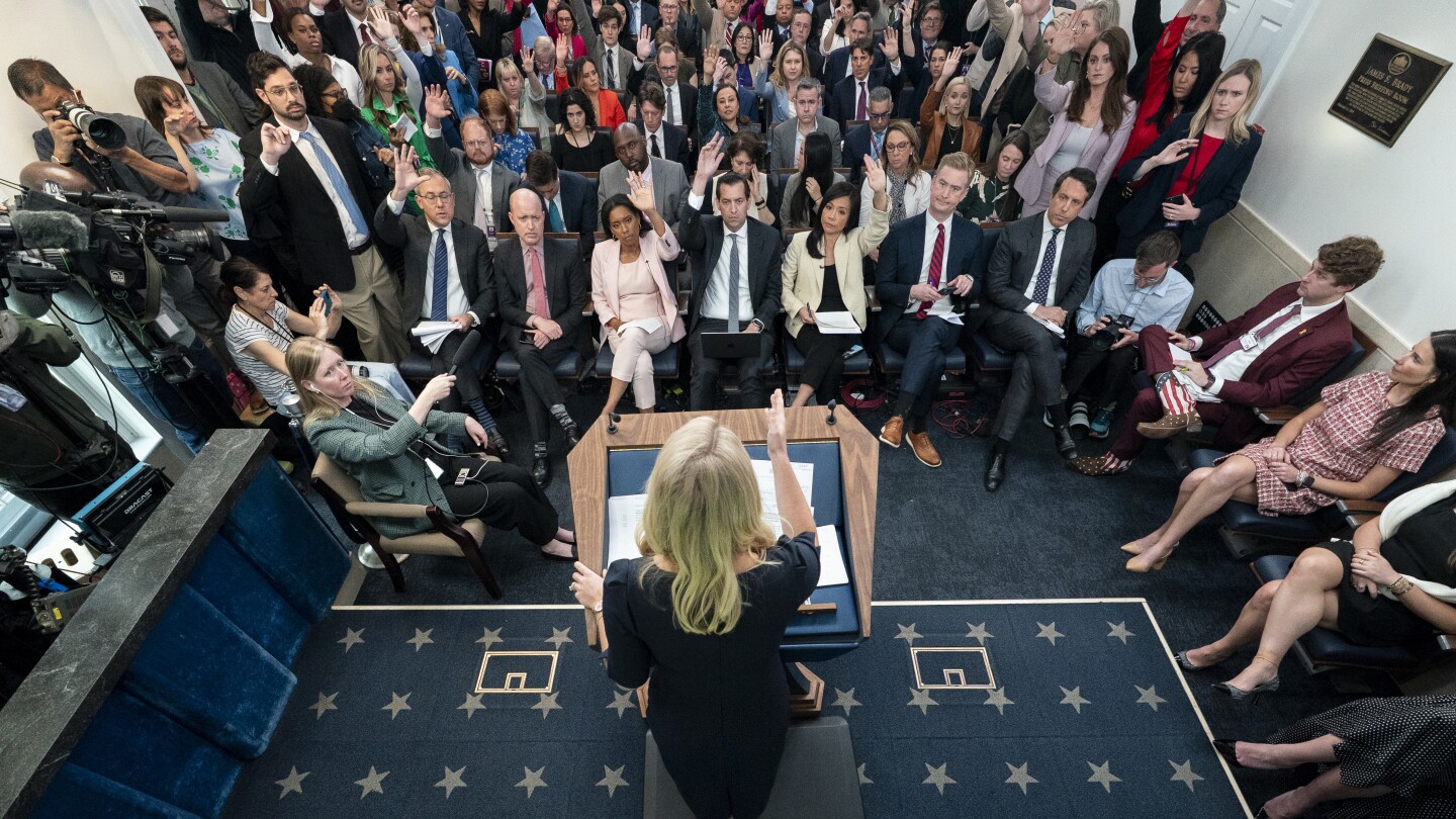 The White House is starting a new media policy that restricts wire services' access to the president