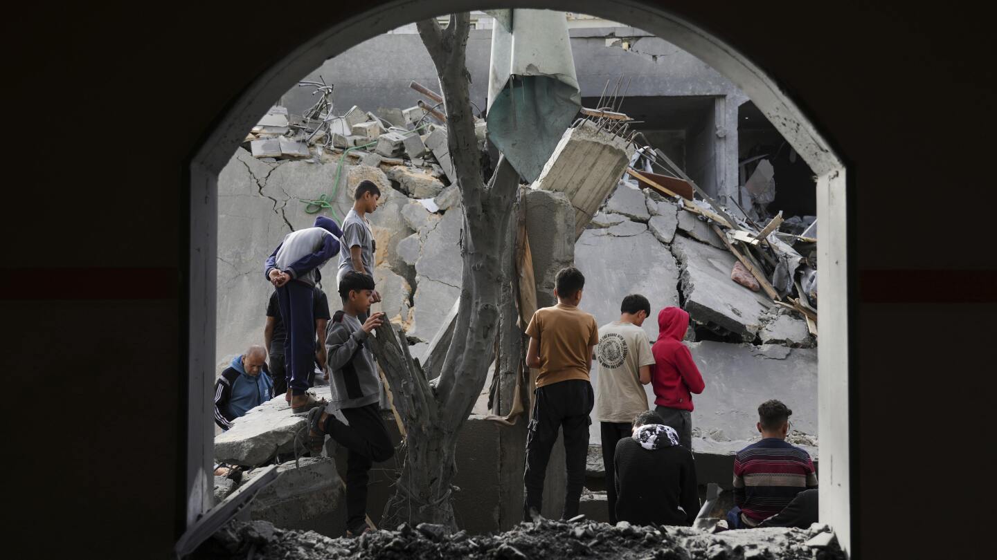 Reporters killed and wounded in Israeli strike on media tent near hospital in Gaza